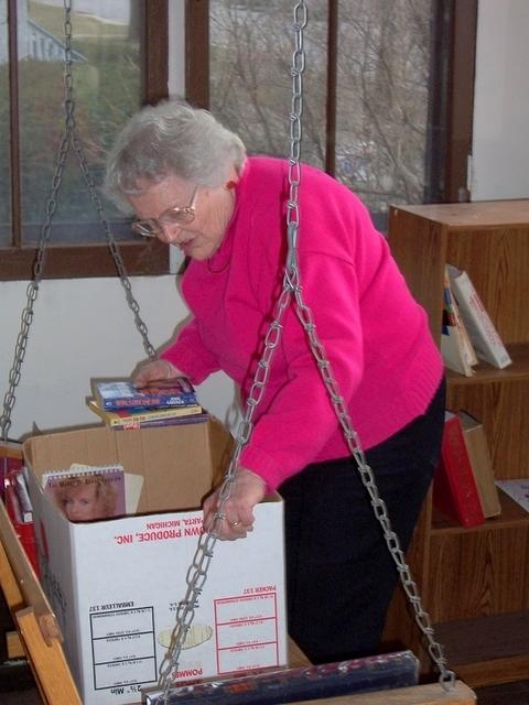 Mom sorting books