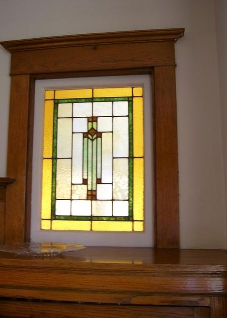 Art glass above china cabinet