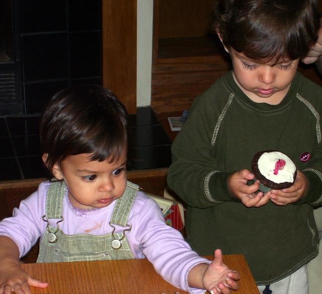 Babies with cupcakes