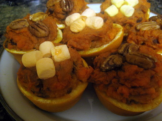 Sweet potatoes with gingersnaps in orange cups