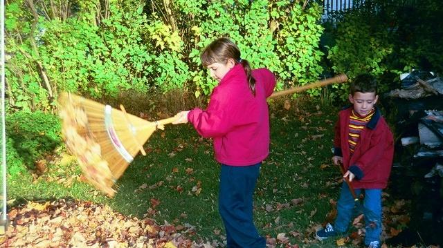 Meredith_Aaron_raking_leaves