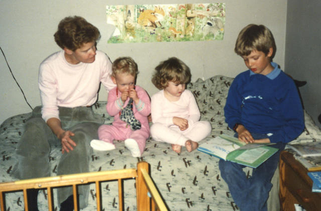 reading to kate and miriam, age 7