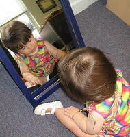 Checking the mirror in my office