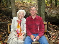 Dan and his wife Esther's Mom on Earl's bench.