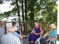 PP, Dave, BJ, Dixons, Azzie talking on the porch