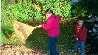 Meredith_Aaron_raking_leaves