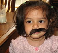 Girl with mustache