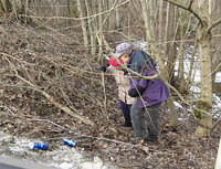 Picking up beer cans