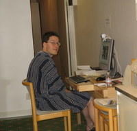 Computing in his bathrobe